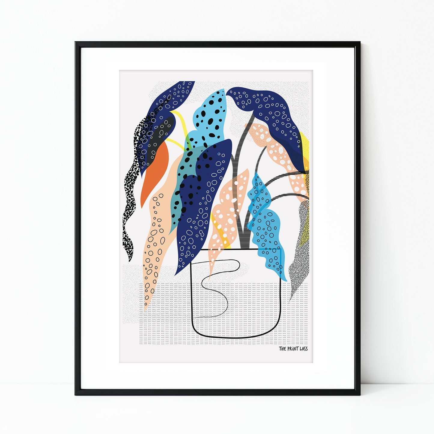Polka Dot Begonia Plant Art Print by The Print Lass. A colourful plant print shown in black frame on a white background.