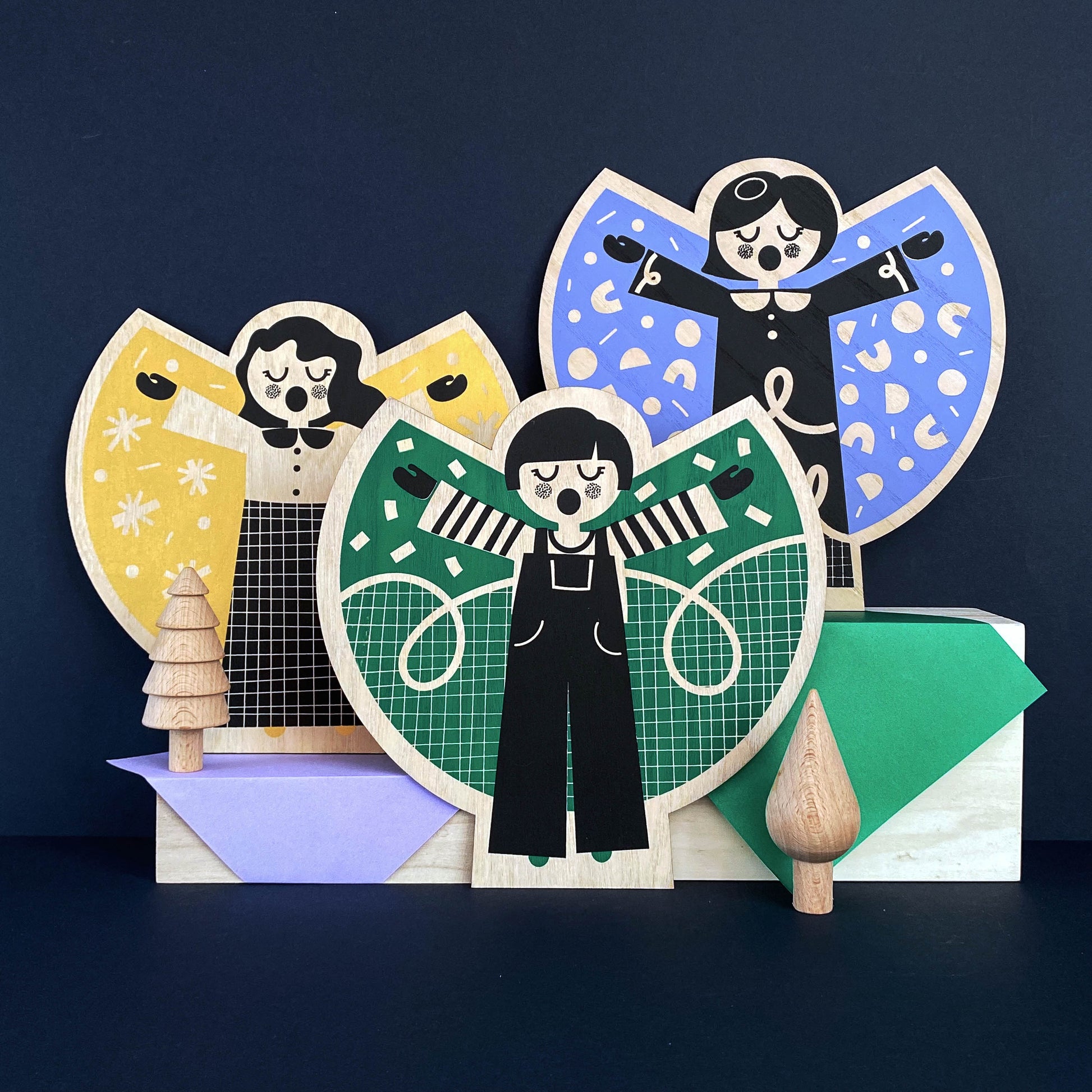 Screen Printed Wooden Angel by The Print Lass - Lilac, green and gold Angels shown on a navy background