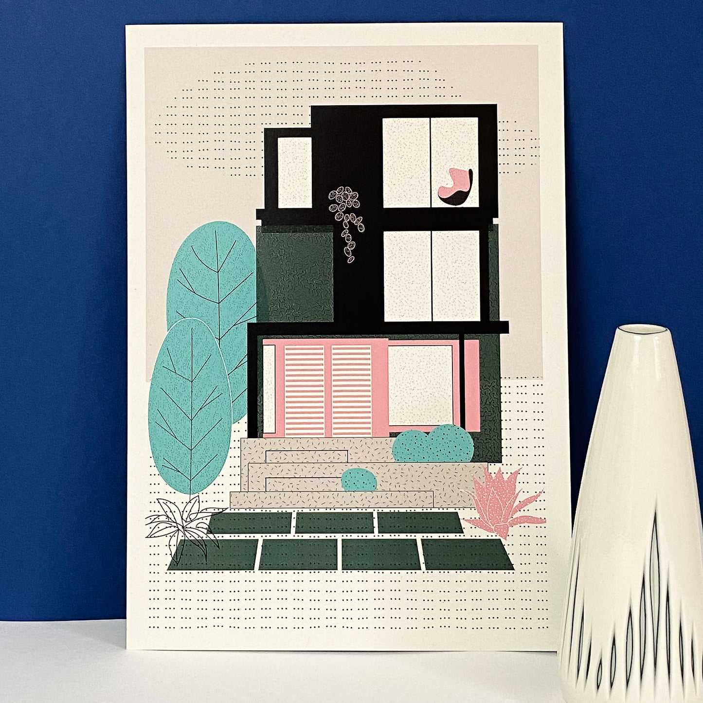 Green Mid Century Townhouse Art Print by The Print Lass. Shown unframed with vase