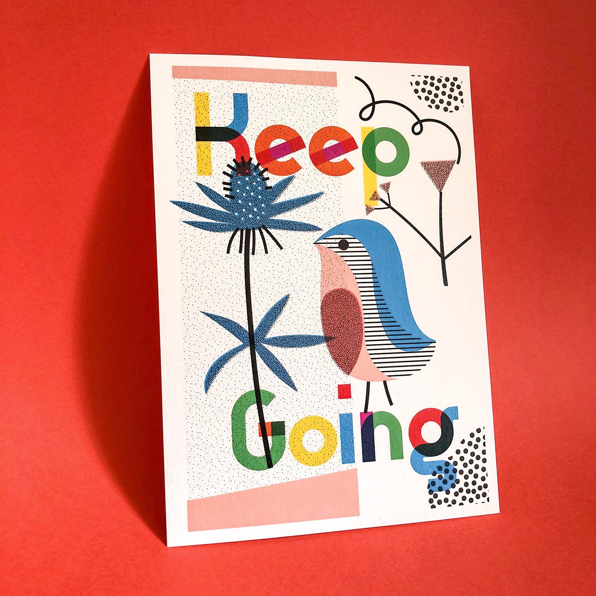 A4 Keep Going Art Print by The Print Lass. Shown unframed on a red background