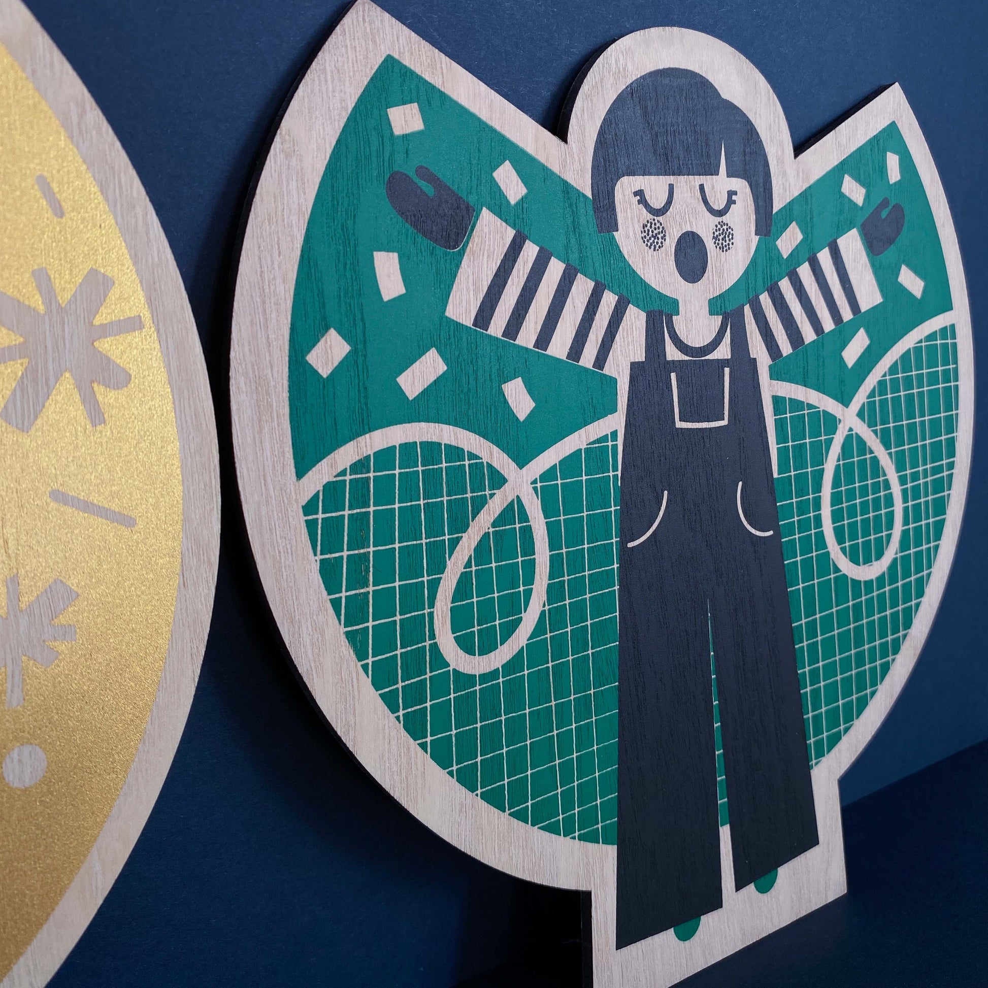 Wooden Screen Printed Angel by The Print Lass - green wooden angel shown on navy background